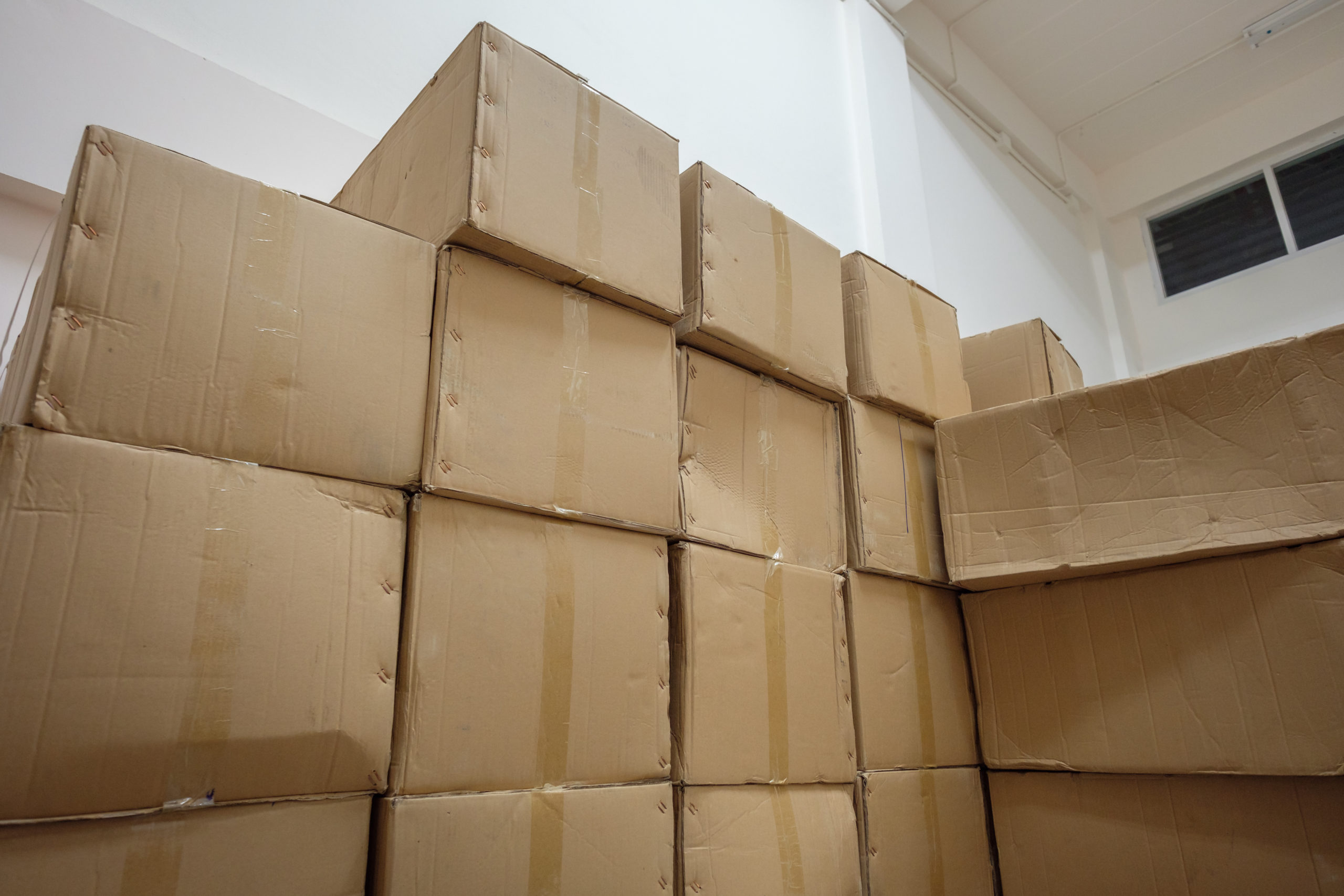 Cardboard storage boxes stacked